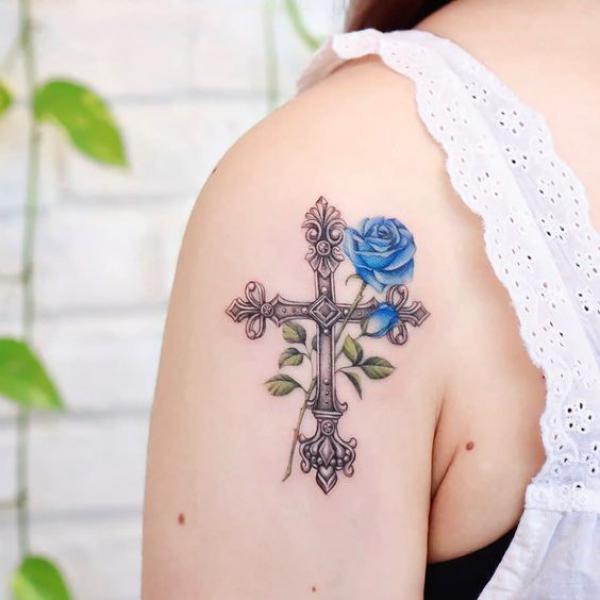 A blue rose with baroque cross